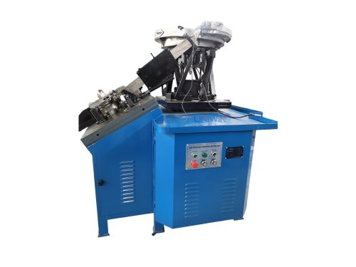 Thread rolling machine for coil nails